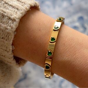 Chic Gold Stainless Steel Bracelet with Green Heart Accents